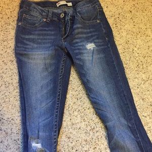 Dark washed ripped jeans